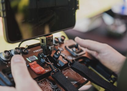 Pilot operating a Pilot Pro controller during Alta X training