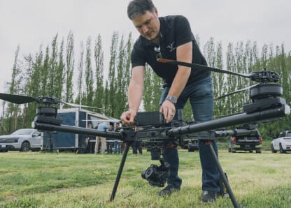 Technician servicing an Alta X Gen2 on the ground during training